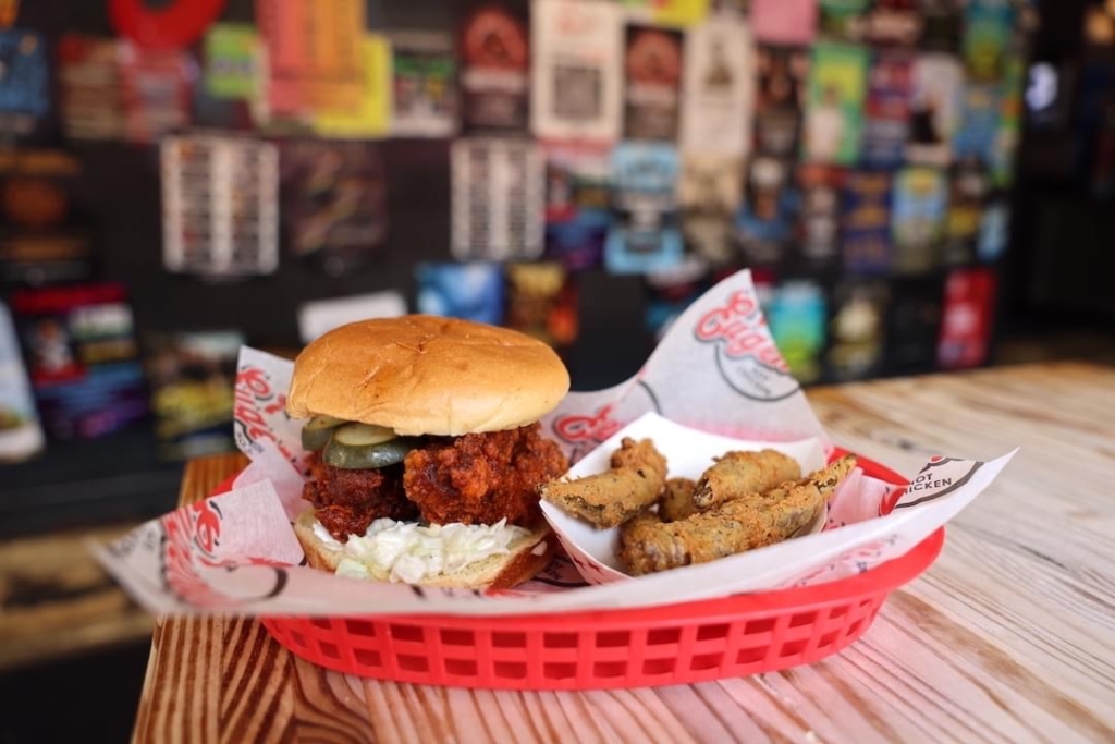 Eugene's Hot Chicken offers fried chicken and tenders in a variety of heat levels. They also have chicken sandwiches, shrimp and fried turkey on the menu. Sides include fries and fried okra. Their ranch dressing, which is a perfect complement to the fried chicken, is homemade. (Photo source: Eugene's Hot Chicken) 